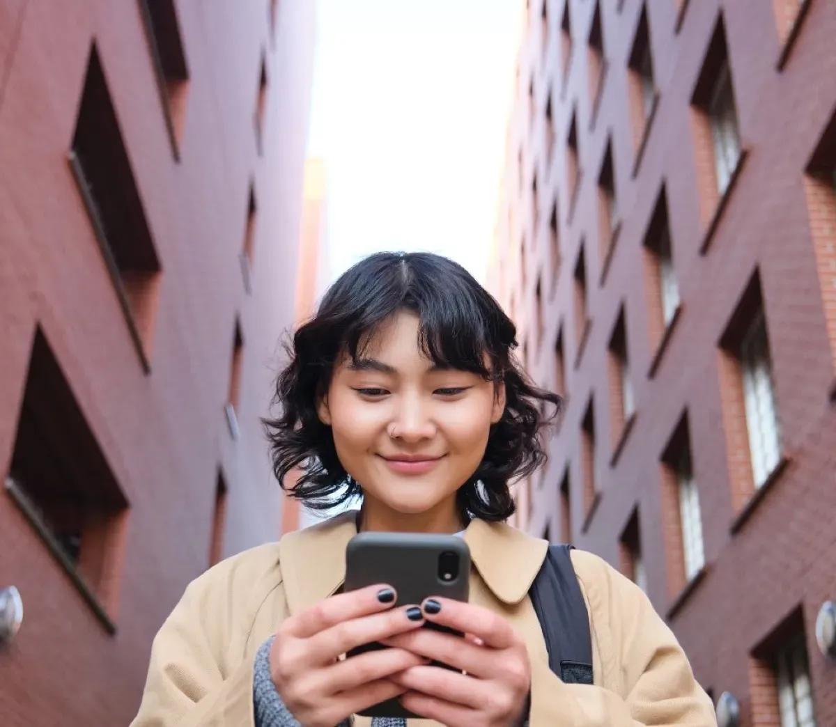 Student using phone on campus